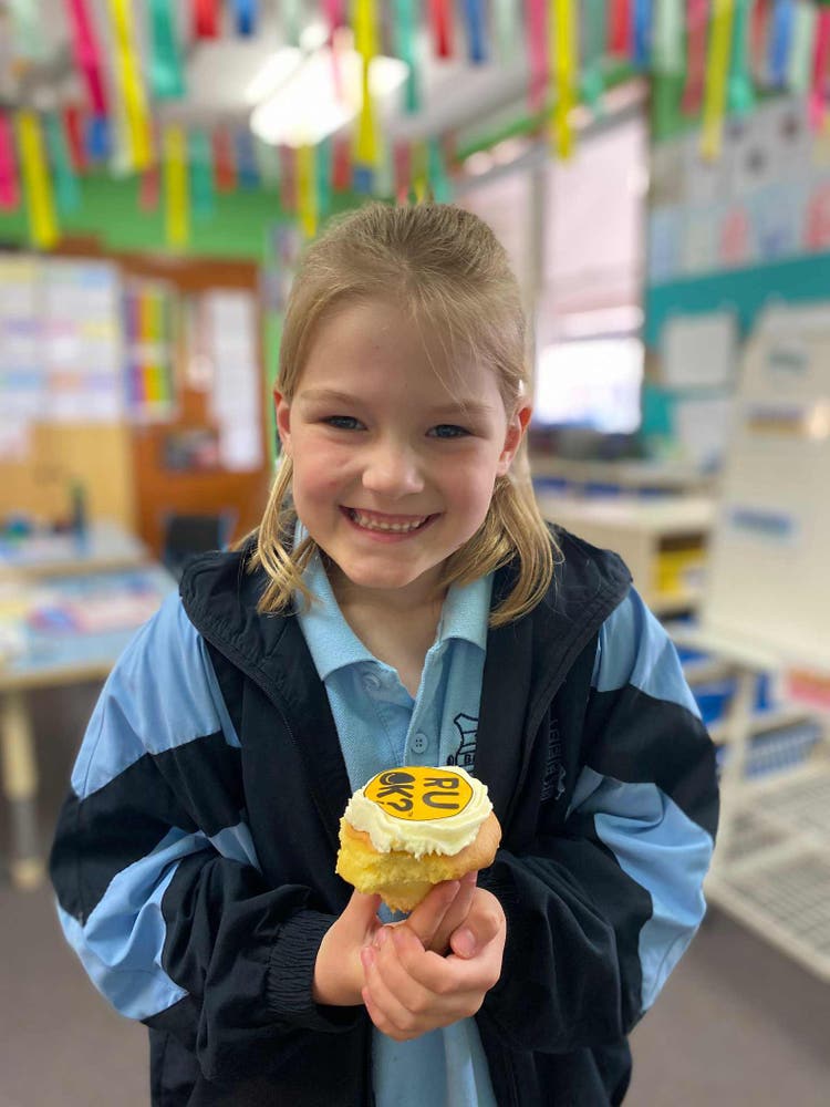 May be an image of 1 person and cupcake